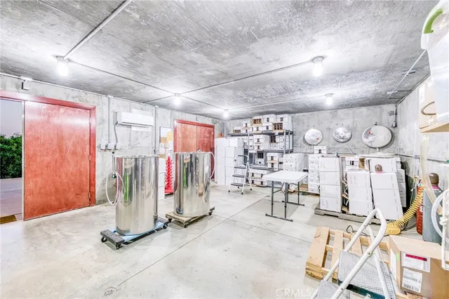 a view of a yard with wooden fence