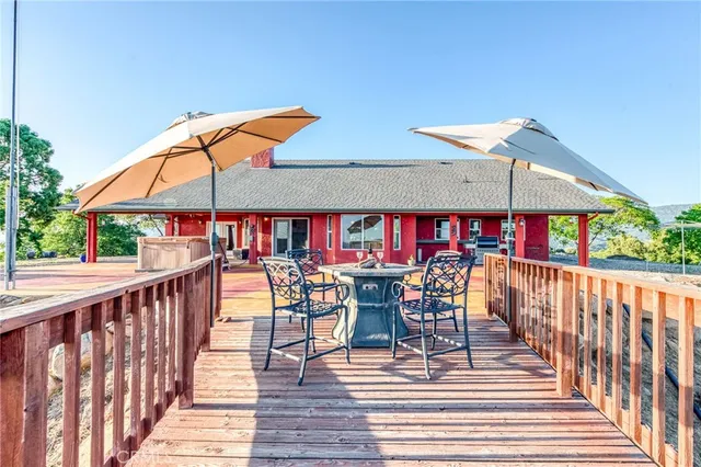 a view of a swimming pool with an outdoor space and seating area