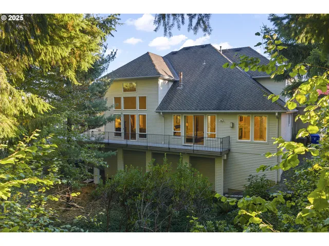 a aerial view of a house with swimming pool
