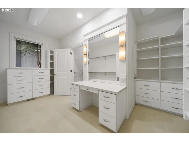 a view of cabinets and wooden floor