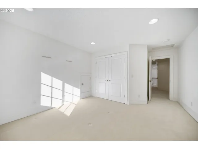 a bathroom with a granite countertop sink mirror and