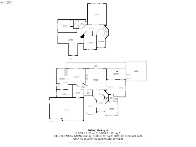 a view of a white house next to a yard with big trees