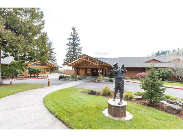 a view of a chair and tables in the patio