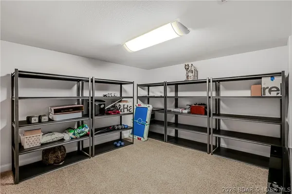 $965,000 | 115 Pebble Beach Lane, Lake Ozark, MO 65049