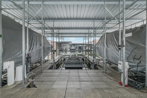 $965,000 | 115 Pebble Beach Lane, Lake Ozark, MO 65049