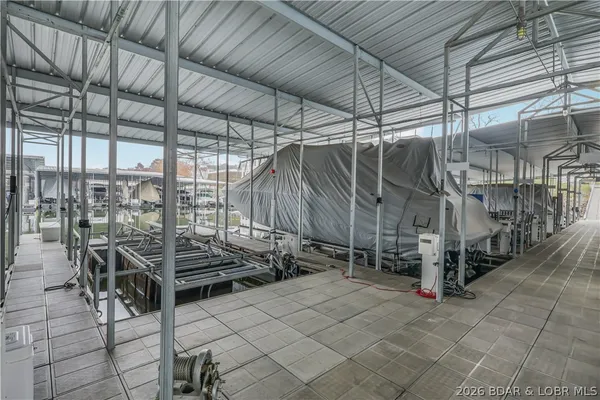 $965,000 | 115 Pebble Beach Lane, Lake Ozark, MO 65049