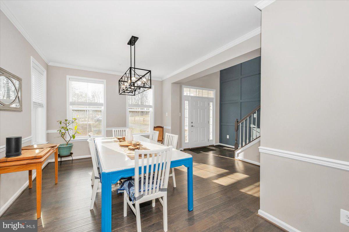 7796 Old Receiver Road Frederick, MD 21702 - Photo 11 of 65 a dining room with furniture window and wooden floor