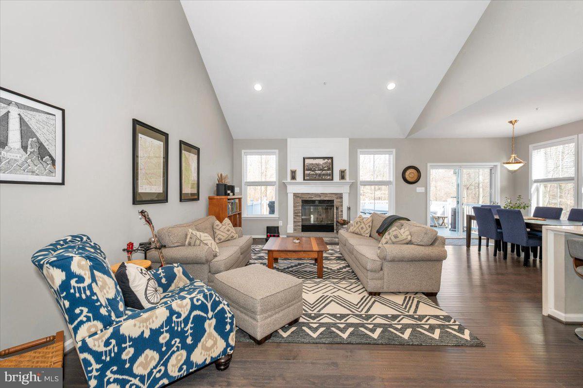 7796 Old Receiver Road Frederick, MD 21702 - Photo 15 of 65 a living room with fireplace furniture and a table