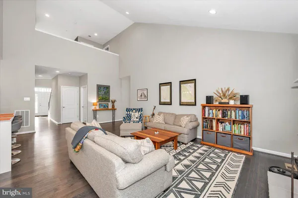 a kitchen with stainless steel appliances kitchen island granite countertop a sink and cabinets