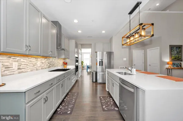 a bathroom with a toilet and a sink