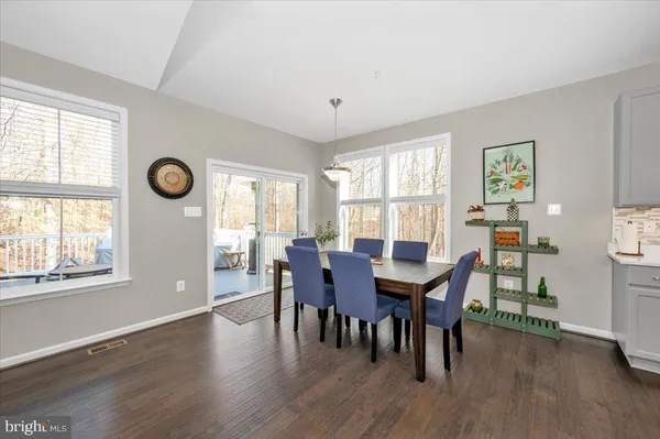 a bedroom with furniture and a tv
