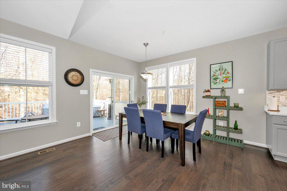 7796 Old Receiver Road Frederick, MD 21702 - Photo 24 of 65 a view of a dining room with furniture window and wooden floor