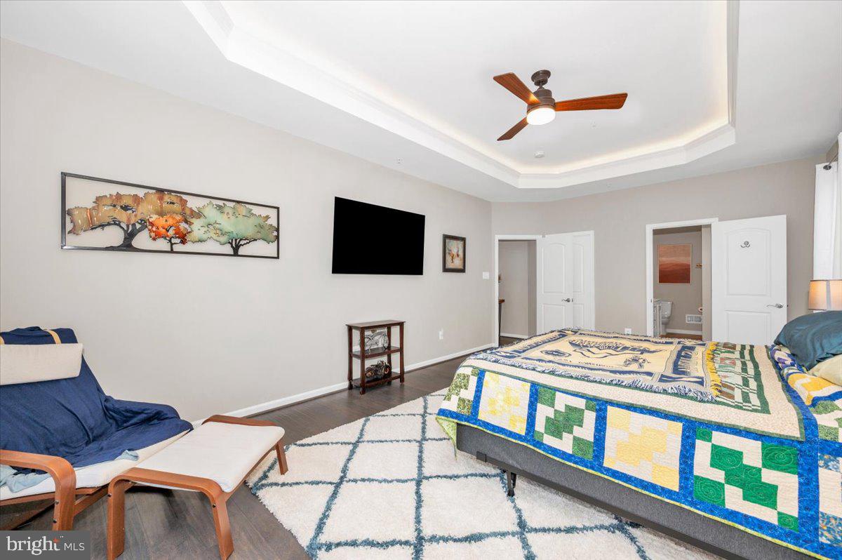 7796 Old Receiver Road Frederick, MD 21702 - Photo 28 of 65 a bedroom with furniture and a tv