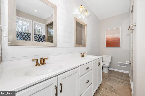 a bed room with a bed and a window