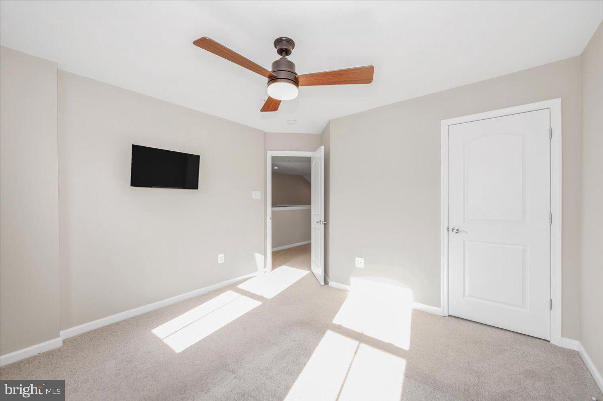 7796 Old Receiver Road Frederick, MD 21702 - Photo 37 of 65 a view of a livingroom with a ceiling fan and window