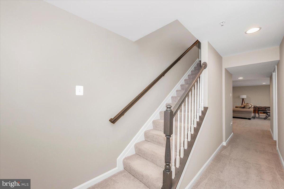 7796 Old Receiver Road Frederick, MD 21702 - Photo 45 of 65 a view of a livingroom with wooden floor and stairs