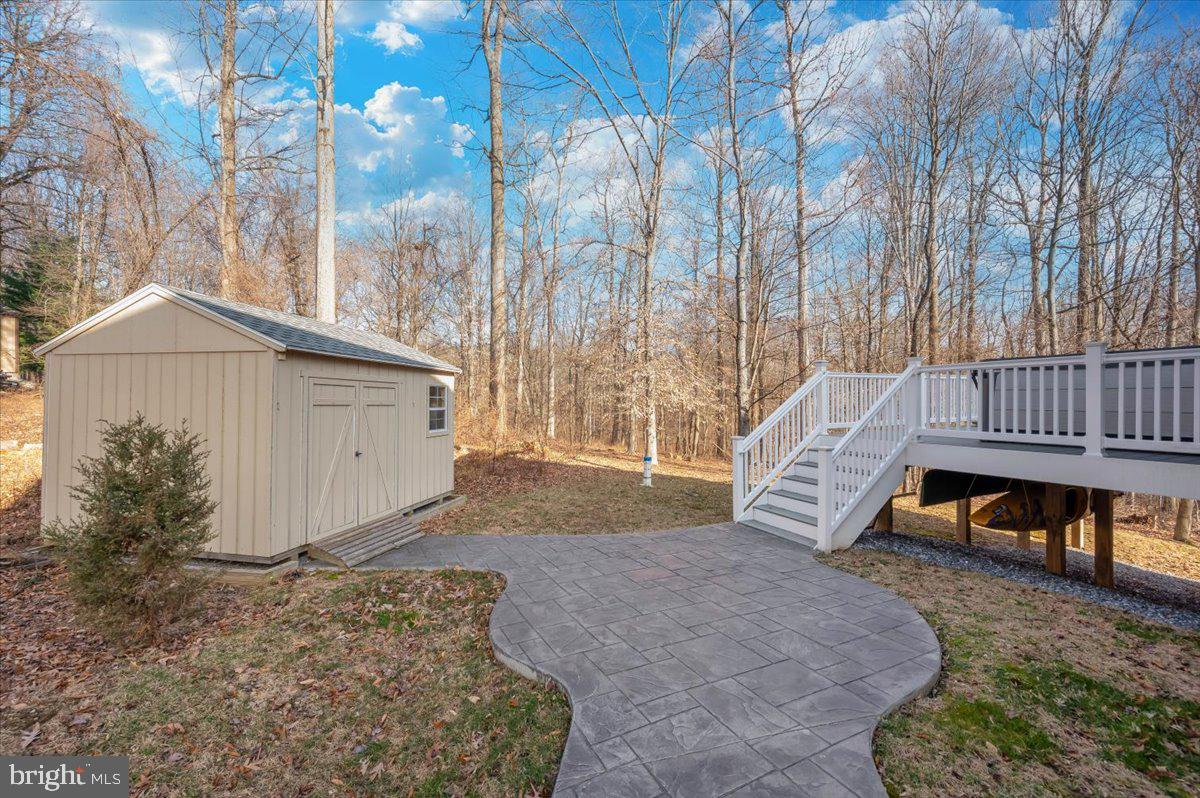 7796 Old Receiver Road Frederick, MD 21702 - Photo 58 of 65 a view of a house with backyard and sitting area