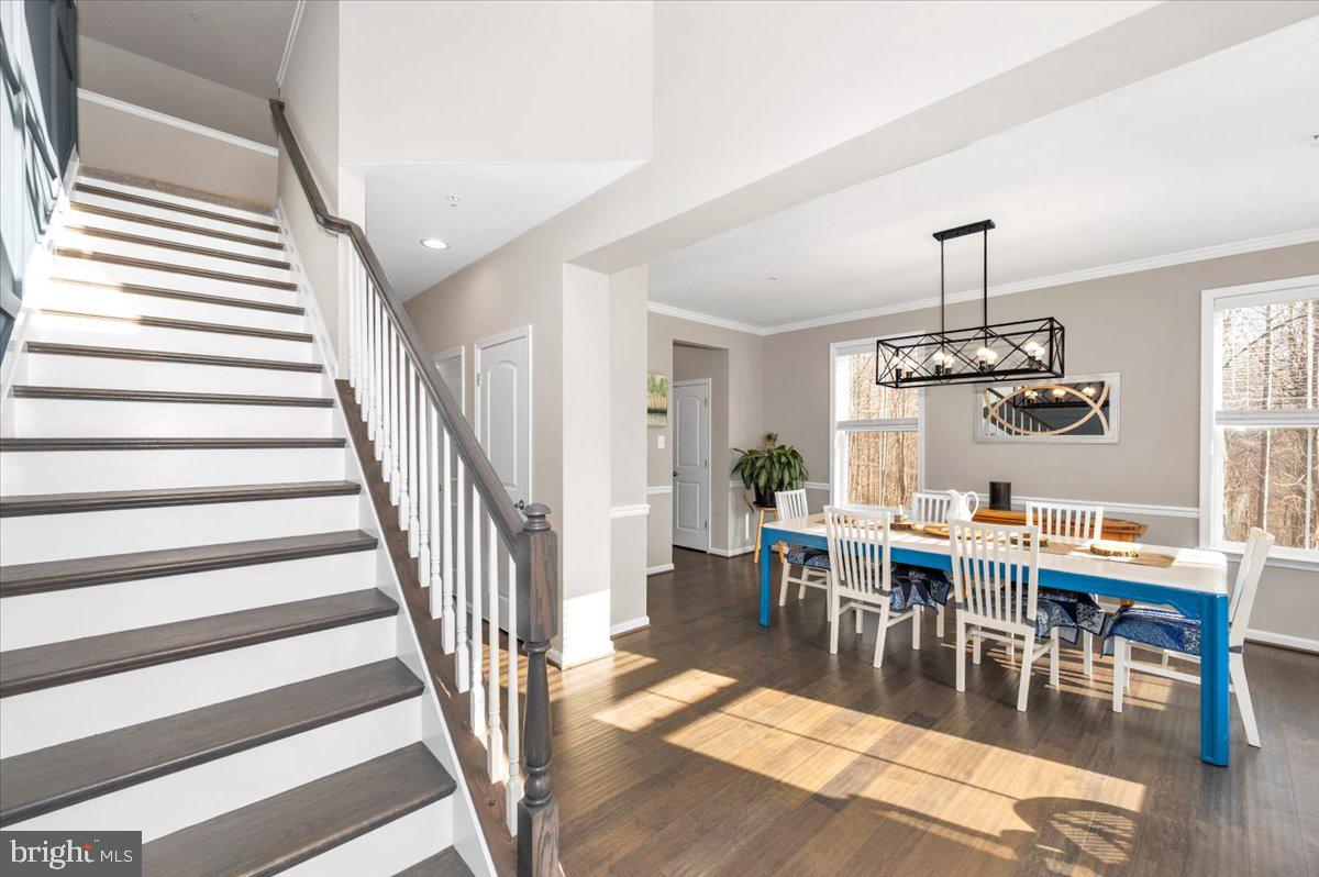 7796 Old Receiver Road Frederick, MD 21702 - Photo 7 of 65 a view of a dining room with furniture window and wooden floor