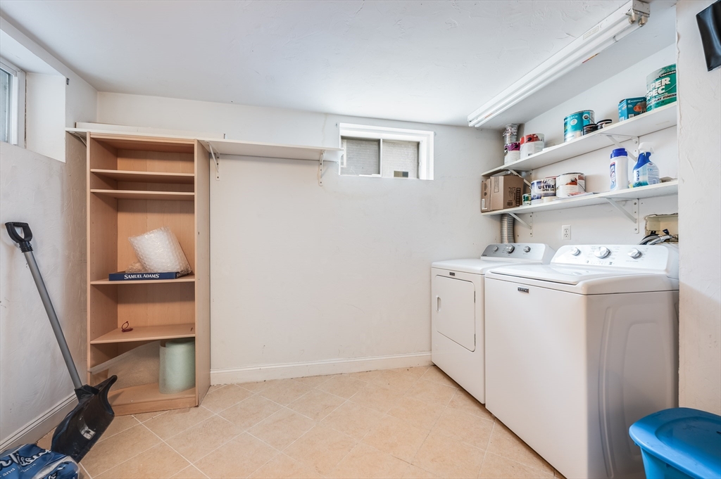 1520 Columbia Road, Unit 2 Boston, MA 02127 - Photo 9 of 16 a utility room with sink dryer and washer