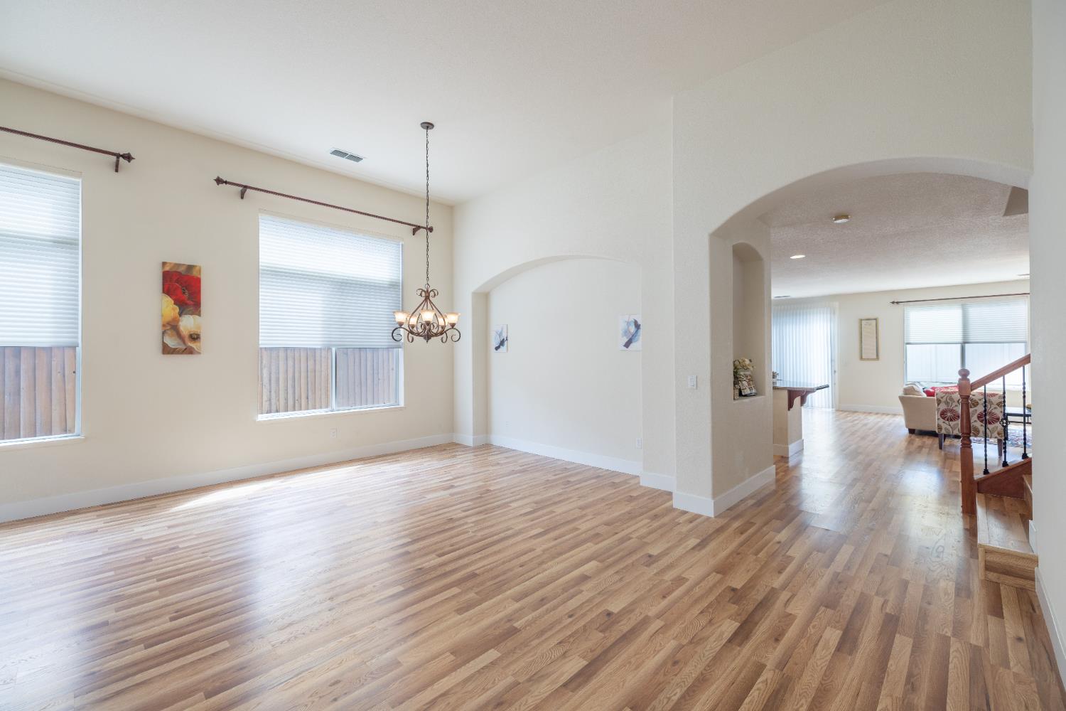 10050 Cameron Pines Way Sacramento, CA 95829 - Photo 12 of 31 a view of a livingroom with wooden floor and a window