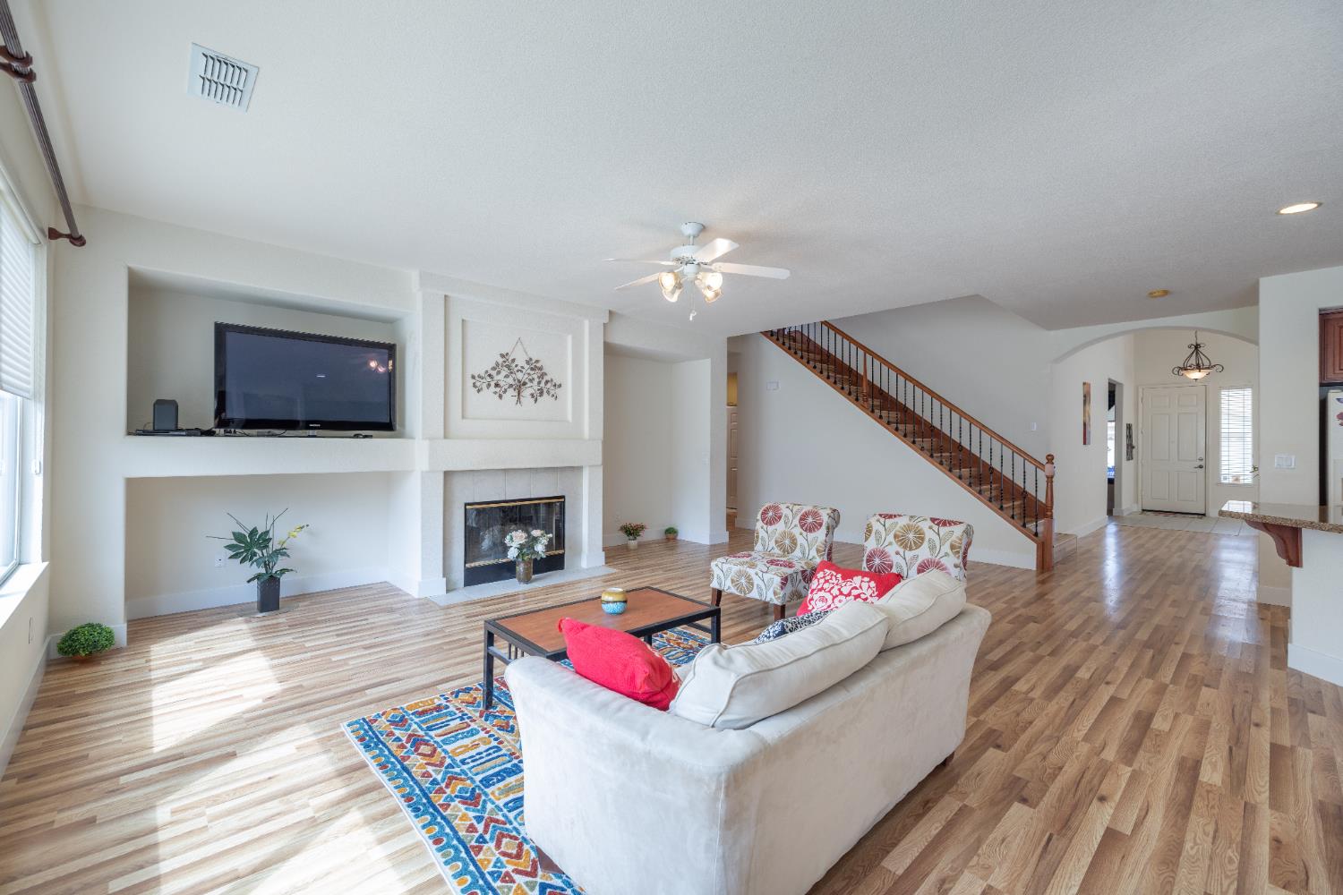 10050 Cameron Pines Way Sacramento, CA 95829 - Photo 14 of 31 a living room with furniture fireplace and flat screen tv