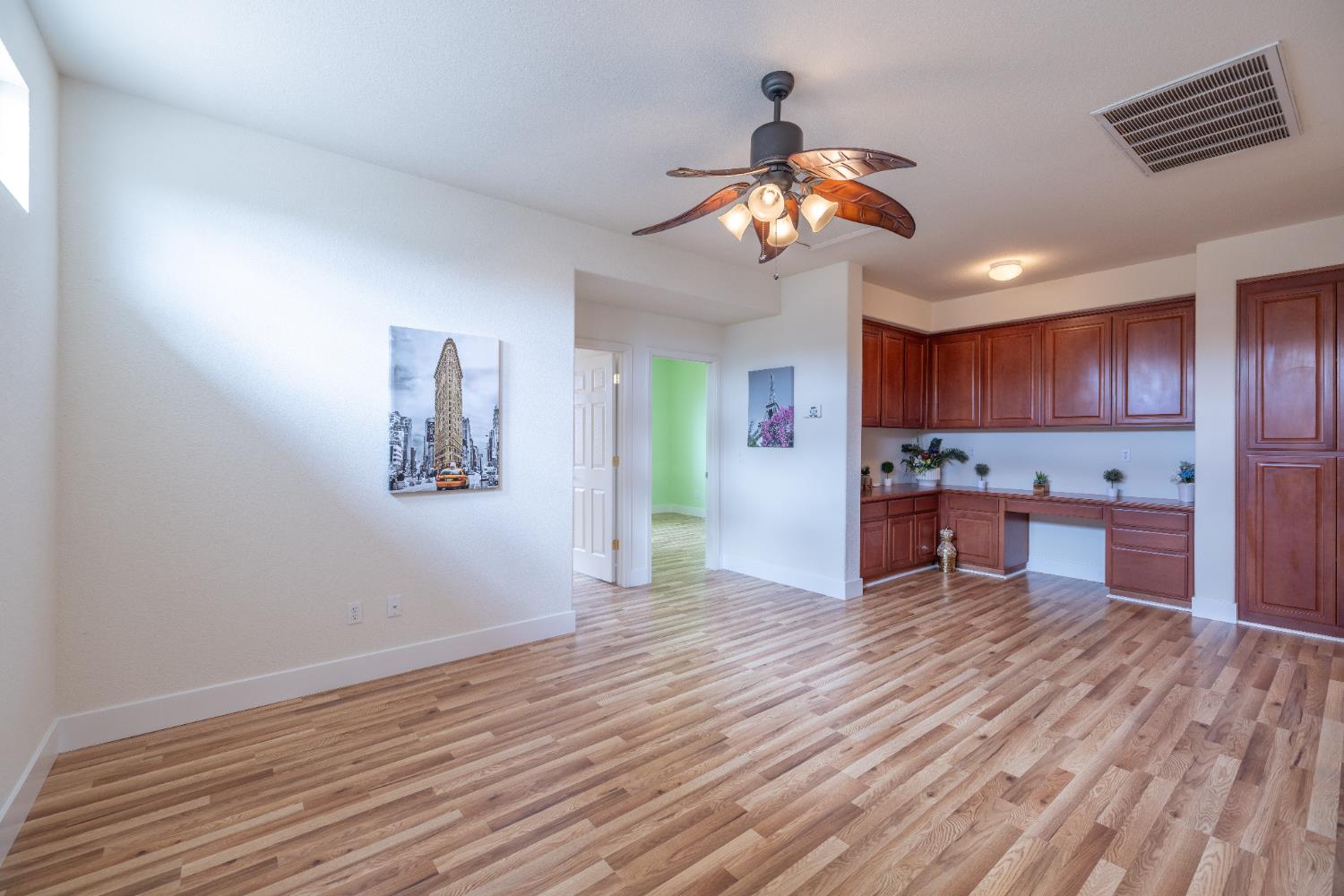 10050 Cameron Pines Way Sacramento, CA 95829 - Photo 20 of 31 a view of kitchen with cabinets and wooden floor