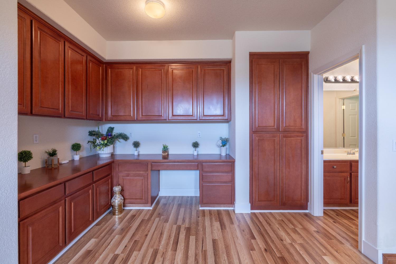 10050 Cameron Pines Way Sacramento, CA 95829 - Photo 21 of 31 a kitchen with stainless steel appliances granite countertop wooden cabinets and sink