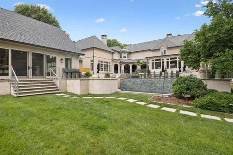 a view of backyard with green space