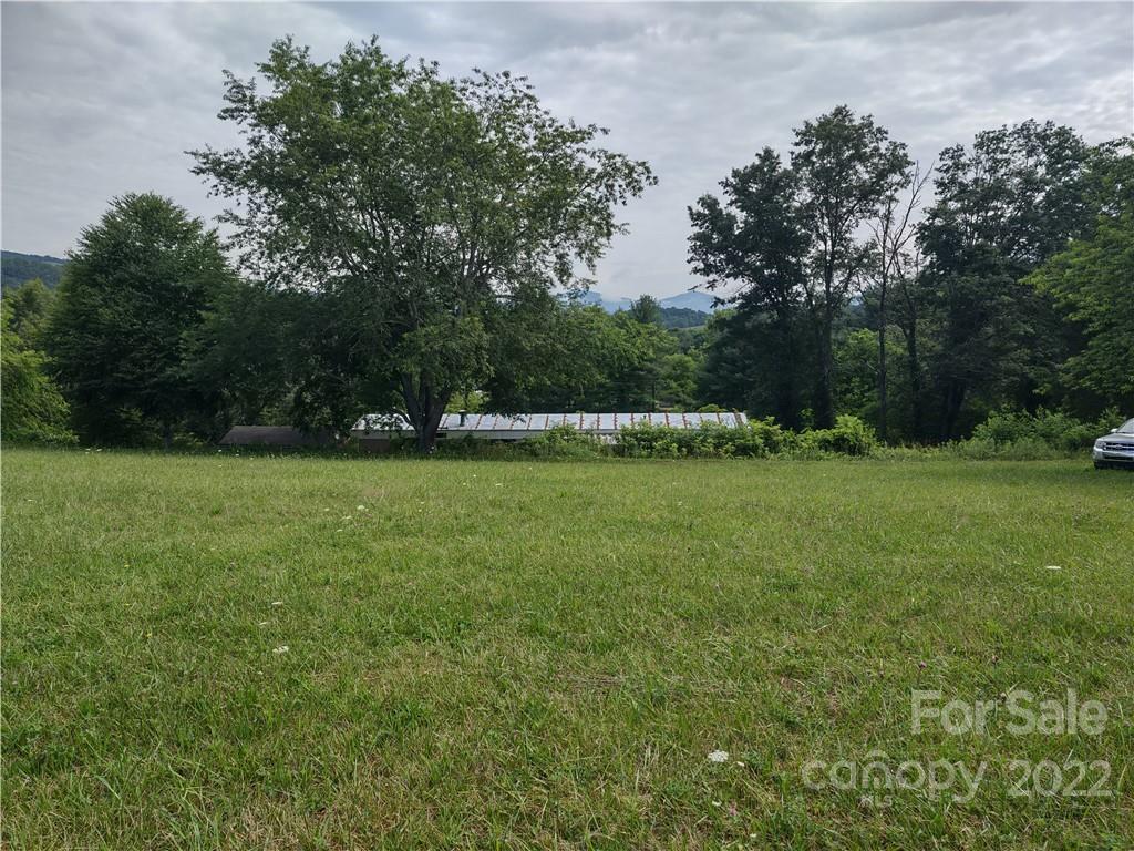 171 Riley Trull Road Canton, NC 28716 - Photo 7 of 31 a view of outdoor space with deck and yard