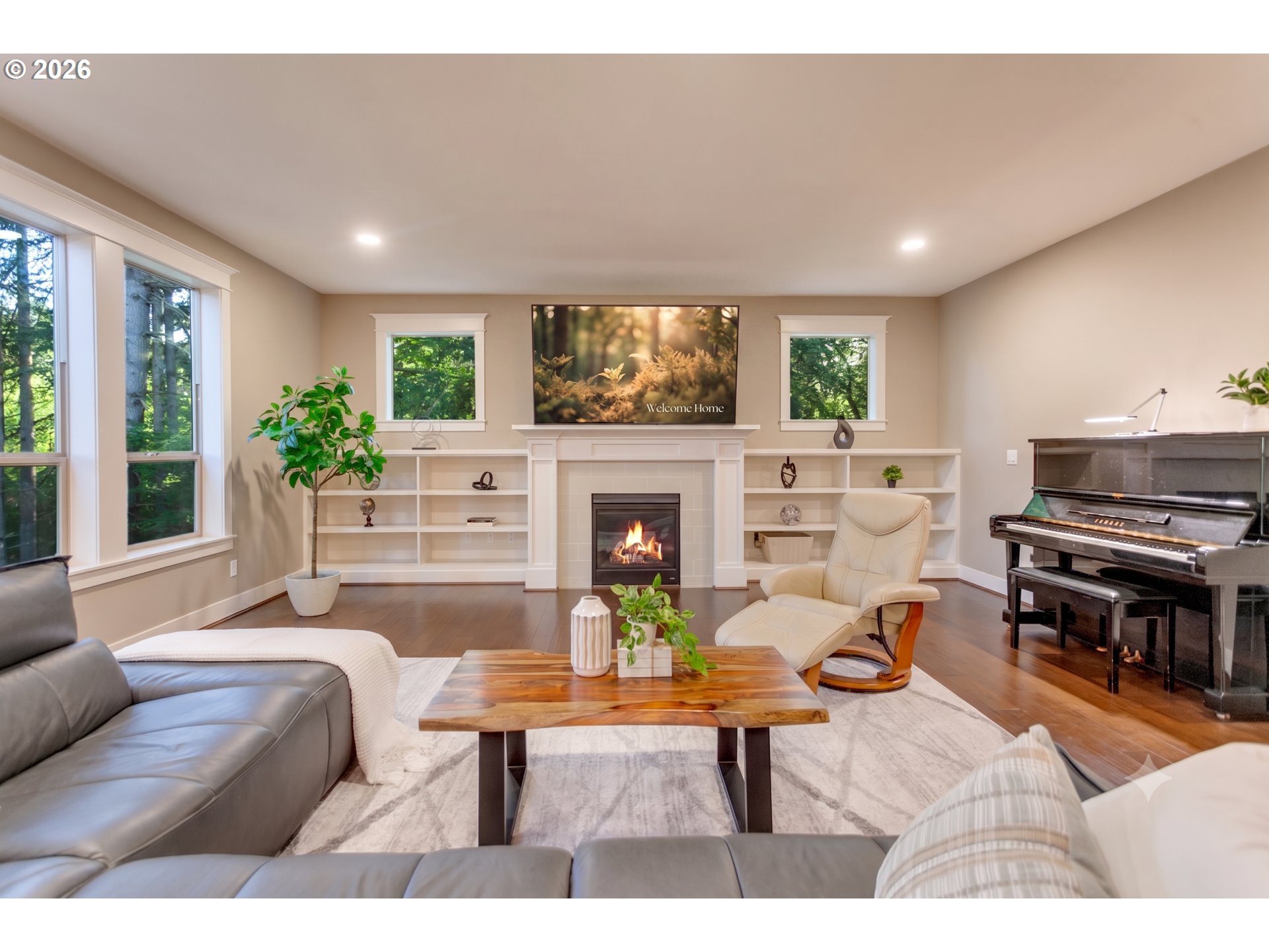 14390 Southwest Fox Lane Beaverton, OR 97008 - Photo 5 of 47 a living room with furniture a fireplace and a large window