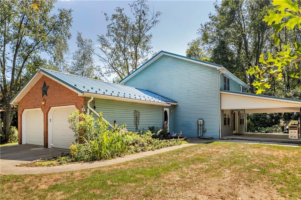 792 Pine Run Road Apollo, PA 15613 - Photo 22 of 25 Back left of the house, shows the large covered back patio