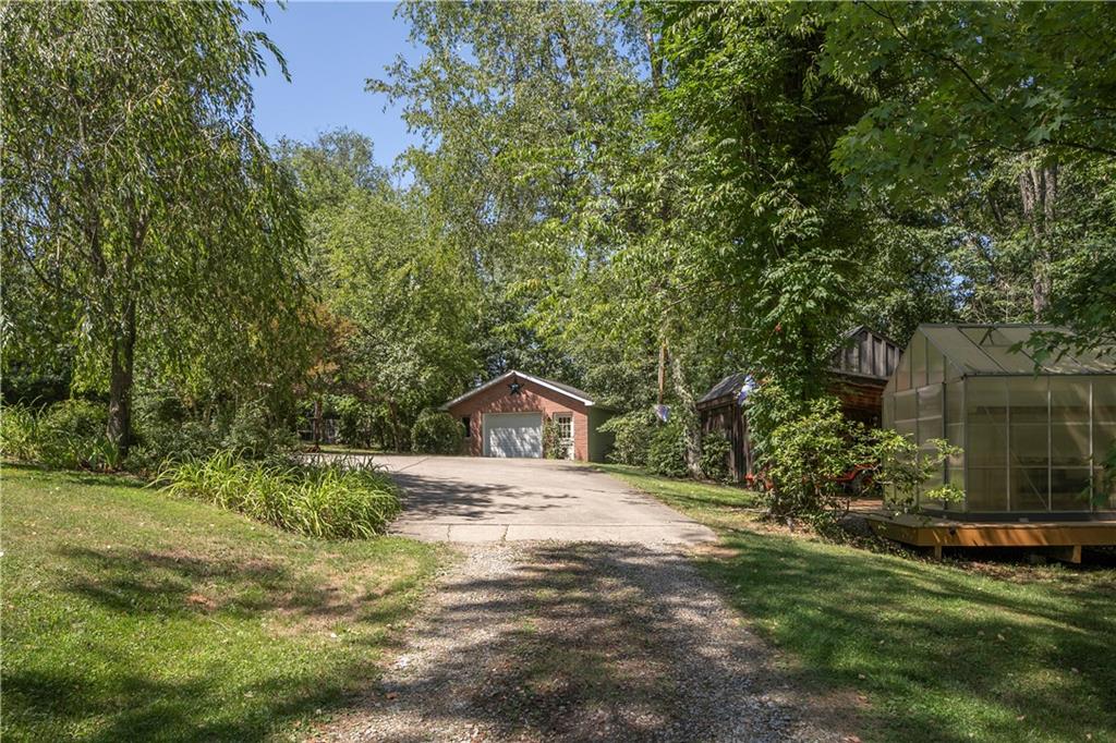 792 Pine Run Road Apollo, PA 15613 - Photo 24 of 25 View from driveway showing the detached garage, shed and greenhouse