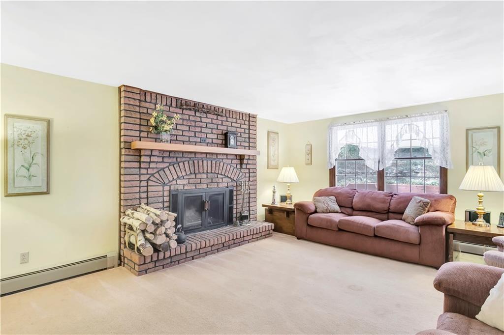 792 Pine Run Road Apollo, PA 15613 - Photo 4 of 25 Living room with wood burning fireplace