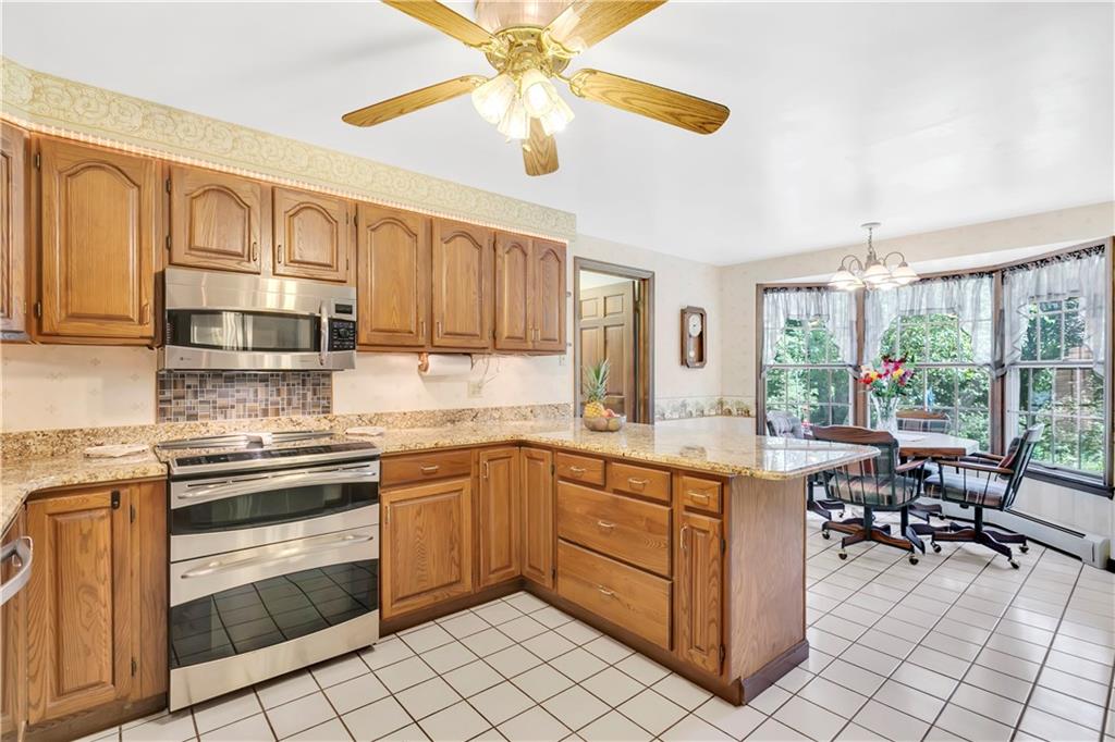 792 Pine Run Road Apollo, PA 15613 - Photo 7 of 25 Eat-in-kitchen with granite counter tops and top of the line appliances