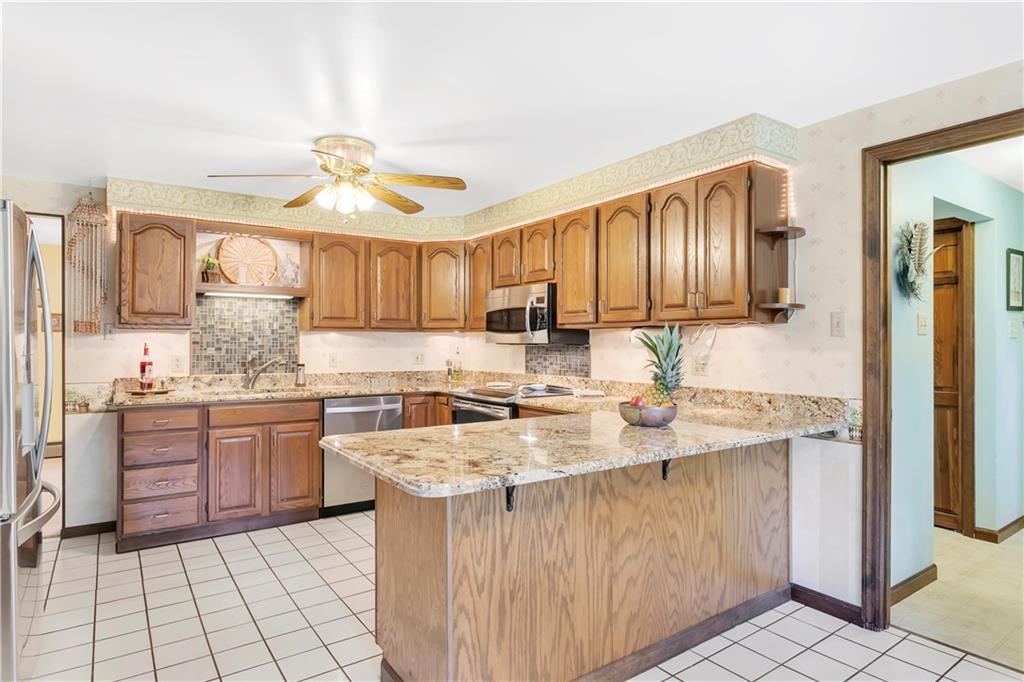 792 Pine Run Road Apollo, PA 15613 - Photo 8 of 25 Eat-in-kitchen with granite counter tops and top of the line appliances view 2