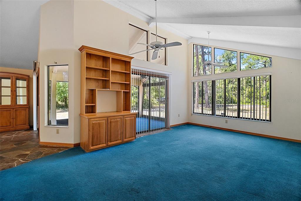 Living room with access to screen porch ~