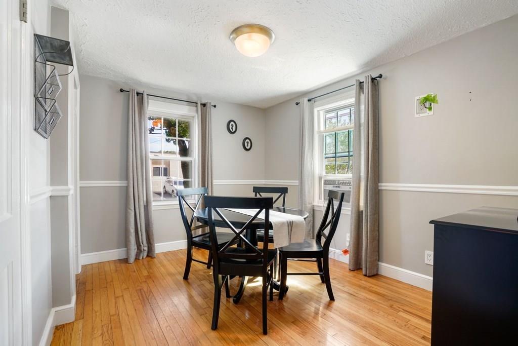 26 Rinaldo Road Weymouth, MA 02191 - Photo 11 of 27 a view of a dining room with furniture and wooden floor