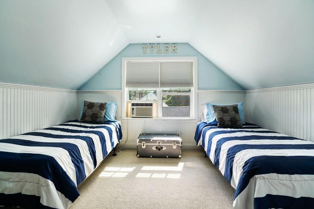 26 Rinaldo Road Weymouth, MA 02191 - Photo 20 of 27 a bedroom with a bed and a window