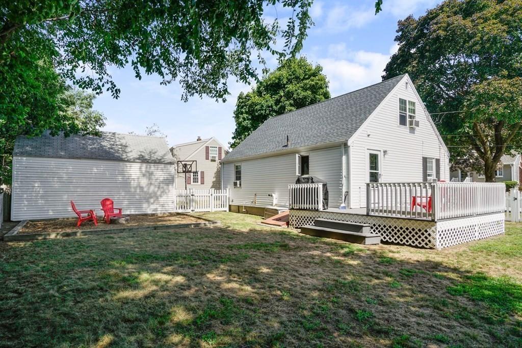 26 Rinaldo Road Weymouth, MA 02191 - Photo 27 of 27 a front view of a house with a garden and plants