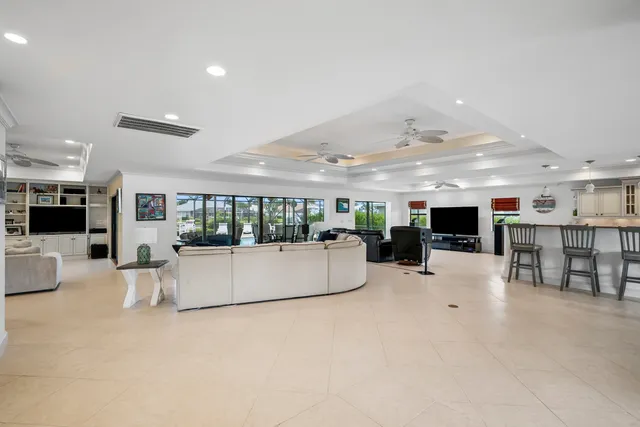 a kitchen with stainless steel appliances granite countertop a stove and a sink
