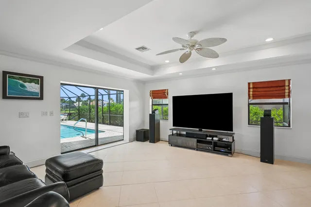 a bedroom with a bed and a painting