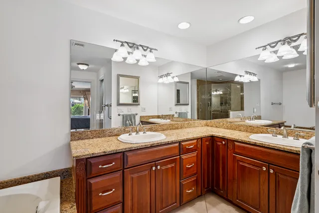 a view of a chairs and table in a patio