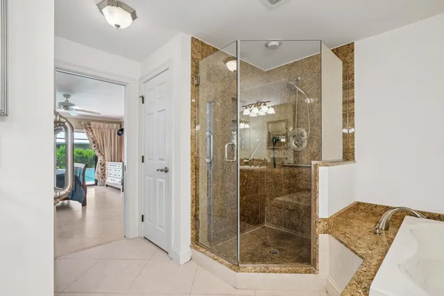 a view of a patio with swimming pool