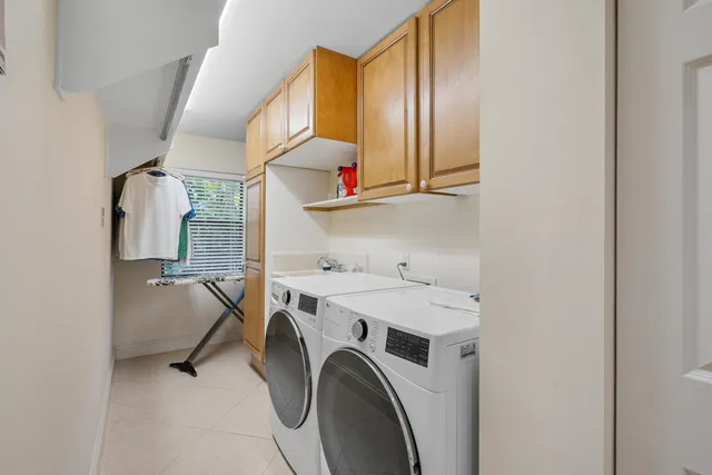 a view of a yard with palm trees