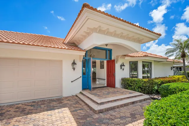 a view of kitchen with furniture and a flat screen tv