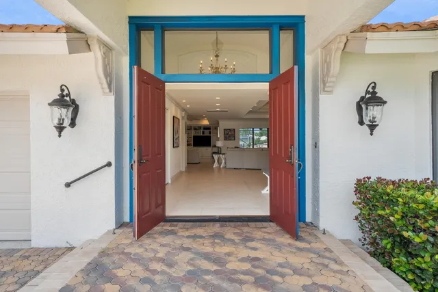 a large kitchen with stainless steel appliances lots of counter top space