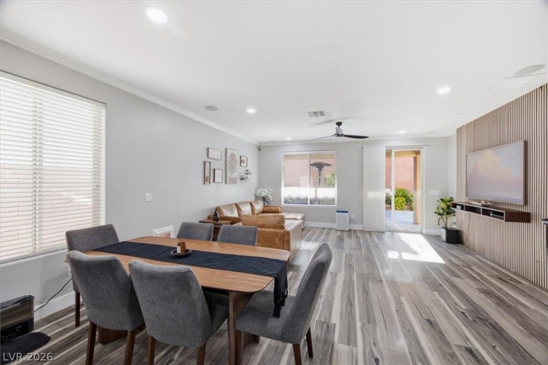 11009 Prairie Grove Road Las Vegas, NV 89179 - Photo 19 of 49 An open-concept living space with sleek flooring and natural light.