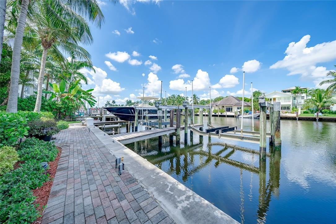 217 Hendricks Isle, Unit 402 Fort Lauderdale, FL 33301 - Photo 26 of 39 a view of a lake and a yard