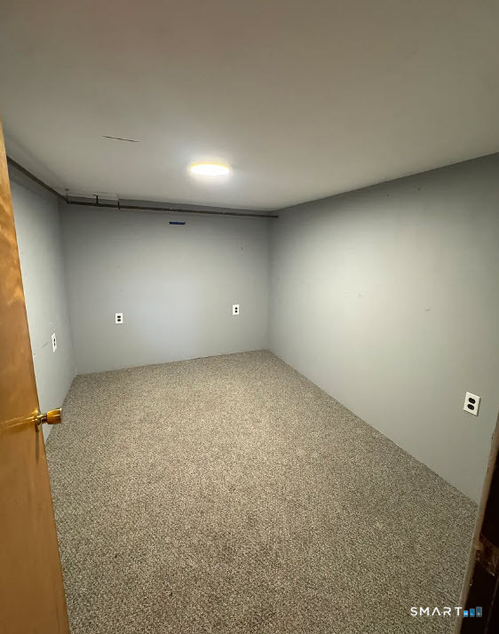 25 Drive Way Guilford, CT 06437 - Photo 16 of 24 Finished, private basement area