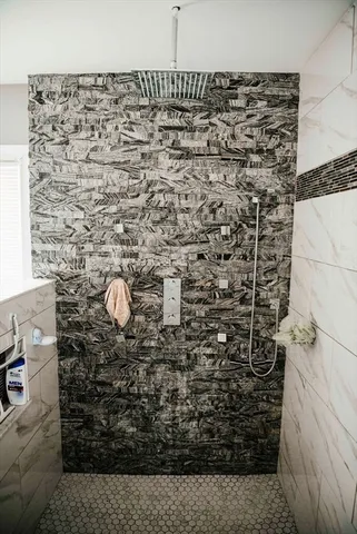 a bathroom with a sink and a shower